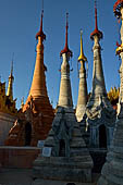 Inle Lake Myanmar. Indein, on the summit of a hill the  Shwe Inn Thein Paya a cluster of hundreds of ancient stupas. Many of them are ruined and overgrown with bushes. 